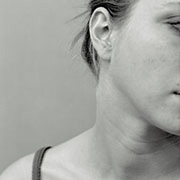 Large format picture of a girl's neck and shoulders